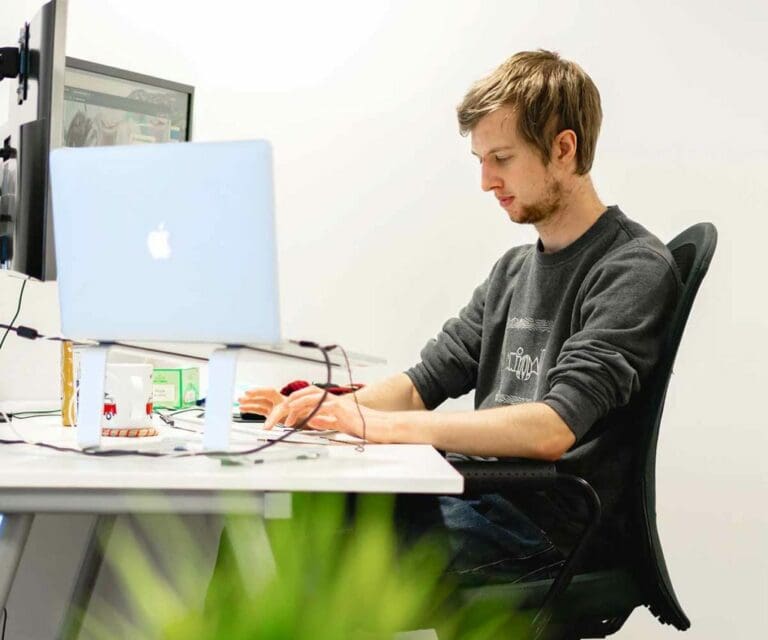 developer sat at desk working