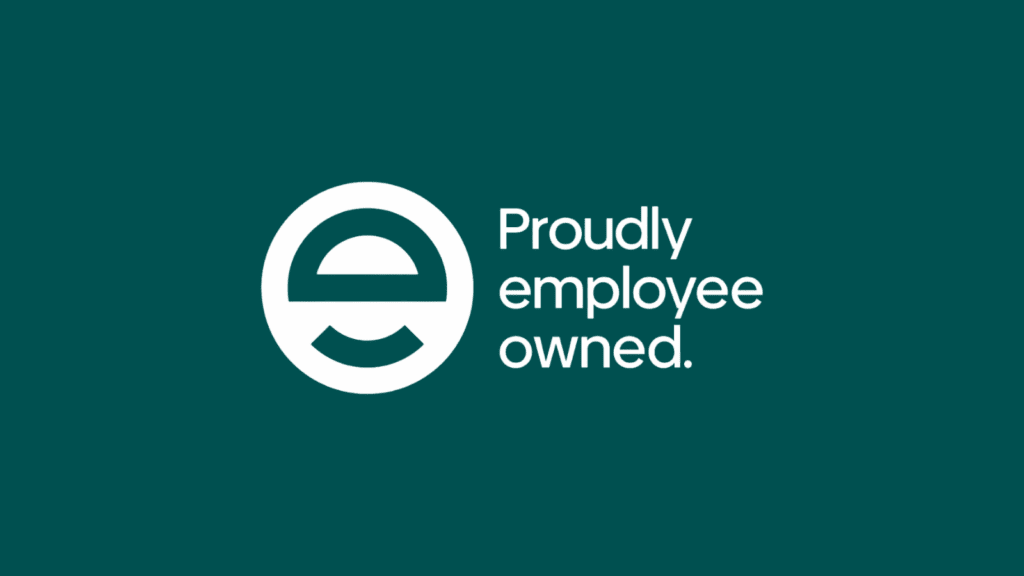Proudly employee owned logo in white on green background.