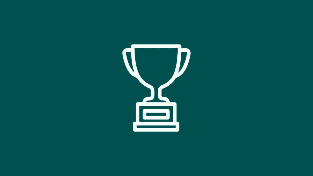 White trophy icon on dark green background.