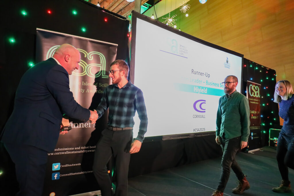 The Hiyield team on stage accepting the runner-up award for low carbon leader at the Cornwall Sustainability Awards.