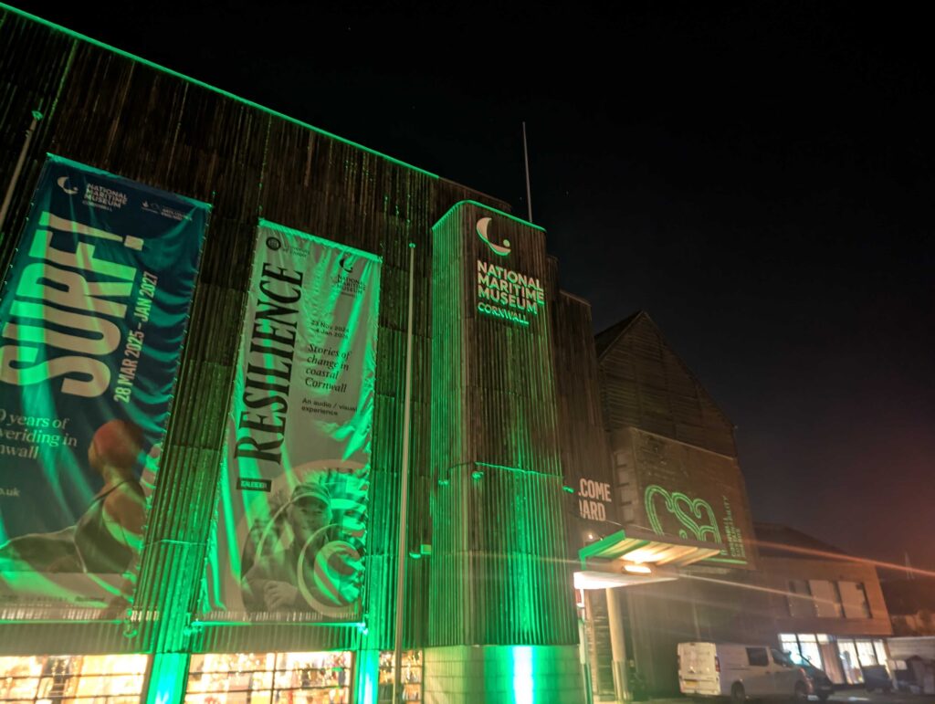 Cornwall Maritime Museum lit up for the Cornwall Sustainability Awards 2025.