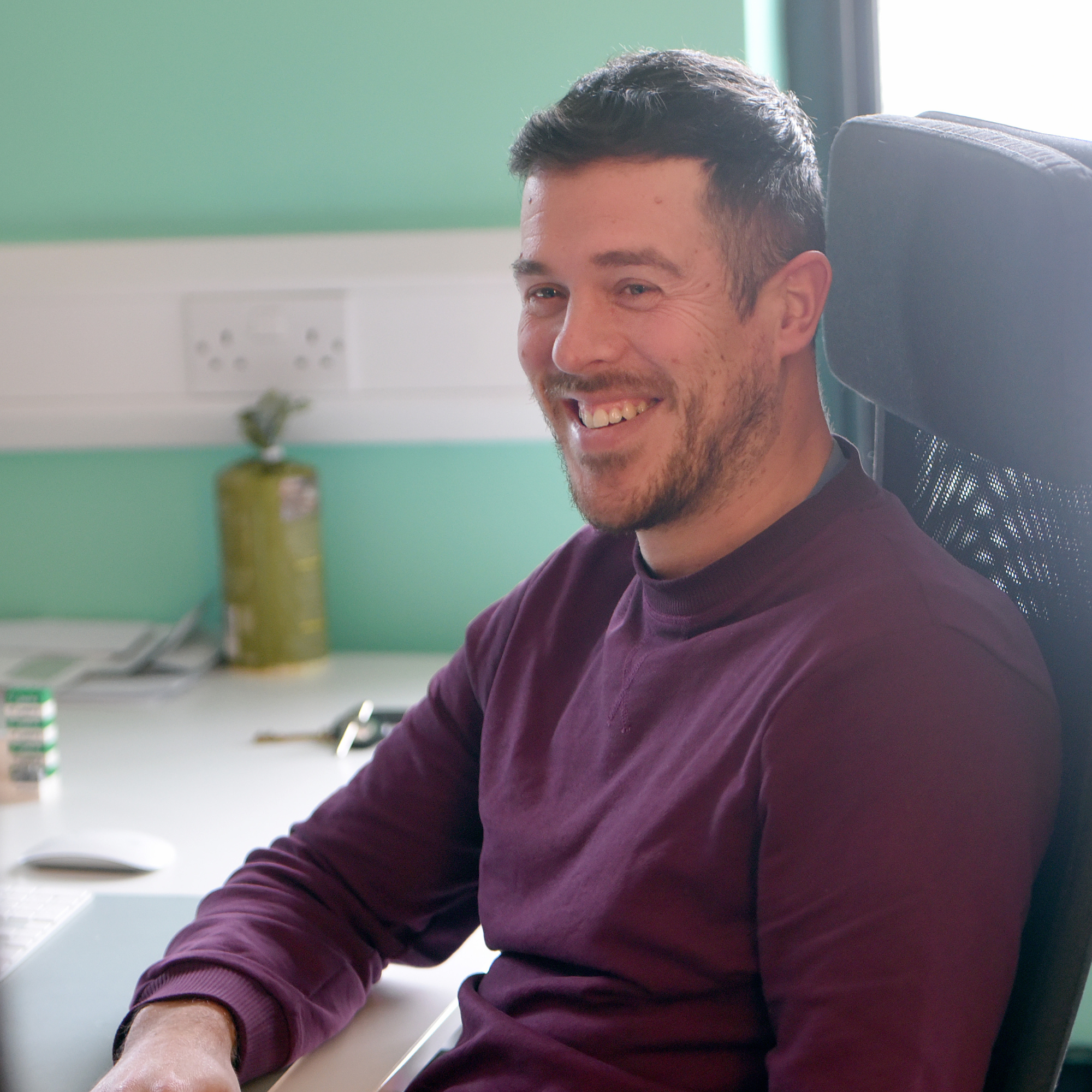 Matt Ville sat at his Hiyield desk smiling.